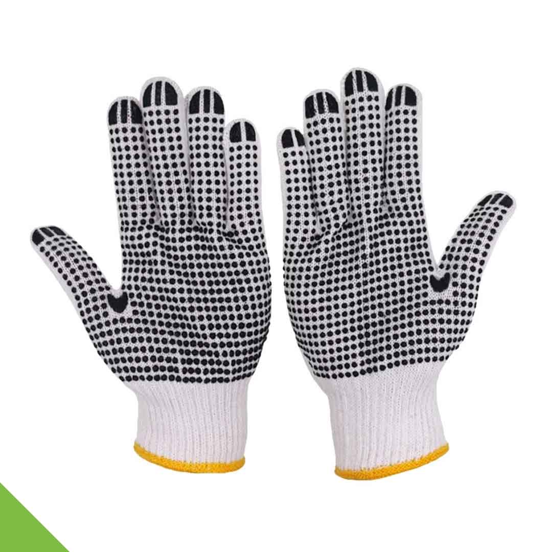 Luva feminina de algodão canvas com pontos em PVC, reversível, destinada a usos gerais de manuseamento.