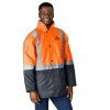 Casaco acolchoado de alta visibilidade, bicolor, com fita refletora prateada e aba contra tempestades (storm flap), concebido para garantir conforto térmico e máxima visibilidade em ambientes de trabalho exigentes.